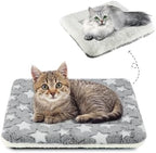 Mora Pets reversible fleece cat bed liner laid flat inside an eighteen inch wire kennel.