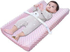 BlueSnail changing pad cover fitted neatly on a standard contoured changing pad