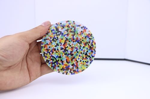 RadBizz sensory fidget pad being held in hand to demonstrate flexibility and size