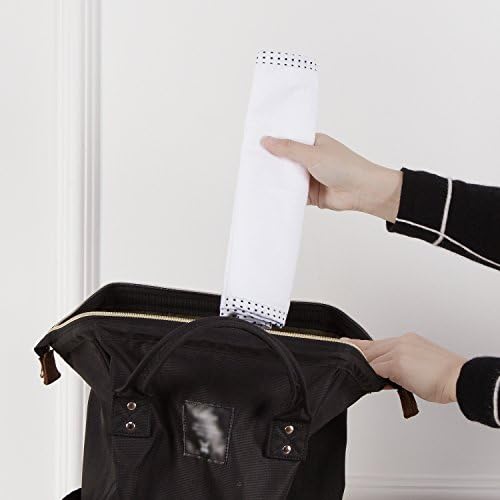 TILLYOU reusable diaper liners laid flat on a changing table