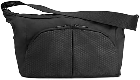 Detailed view of diaper bag zippered pockets and bottle holders