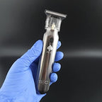 Sleek under five ounce precision trimmer illustrating the ergonomic handle and power switch