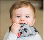 Baby wearing Nuby cotton muslin teething bib with Velcro closure