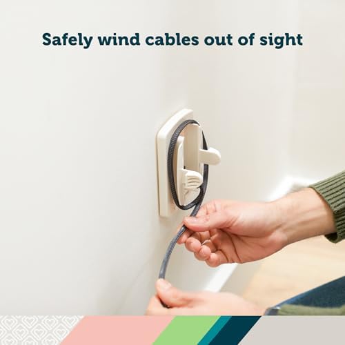 White plastic cord shortener and outlet cover installed
