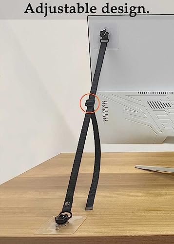 No drill adhesive baby proofing straps securing a wooden cabinet to a smooth living room wall.