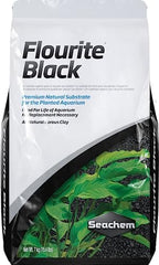 Seachem Flourite Black natural porous clay gravel texture close up