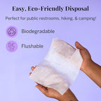 Compact feminine wipes being removed from a travel bag for public restroom use