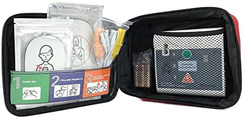 AED trainer kit components including yellow connectors and training pads