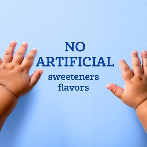 Infant holding and eating whole grain dissolving finger food