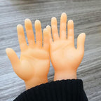 Close up view of the realistic human hand details on the mini puppet fingers.