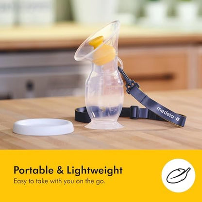 Close up of the twenty-four millimeter breast shield attached to the clear plastic five ounce storage bottle