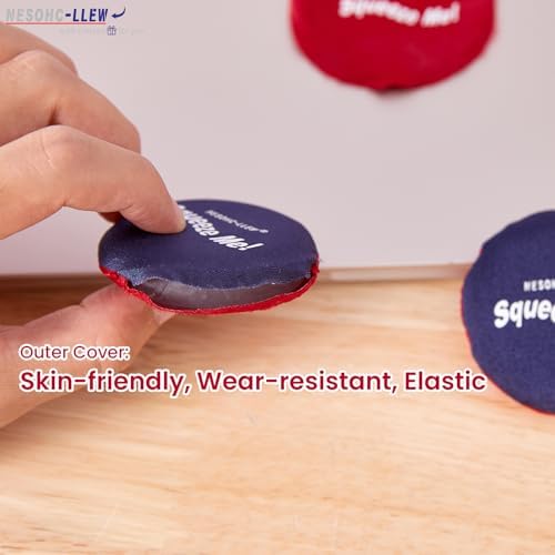 An adult hand squeezing the soft silicone stress relief toy at an office desk.