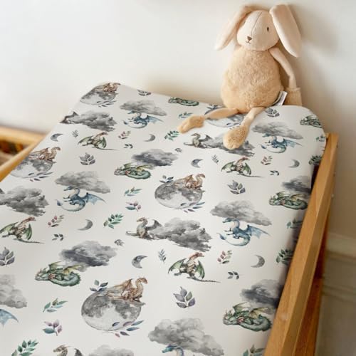 Side angle view of fitted changing pad cover on a standard 32 by 16 inch changing mat