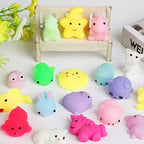 A hand holding a mini soft kawaii cat squishy to demonstrate the small size and texture