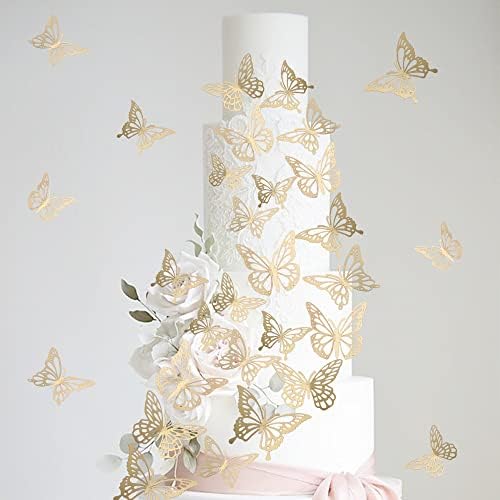 3D butterfly toppers applied on cupcakes for baby shower decor