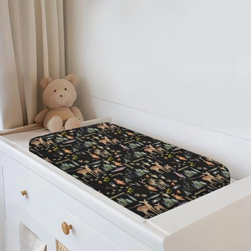 Baby changing pad cover styled on a standard nursery changing table