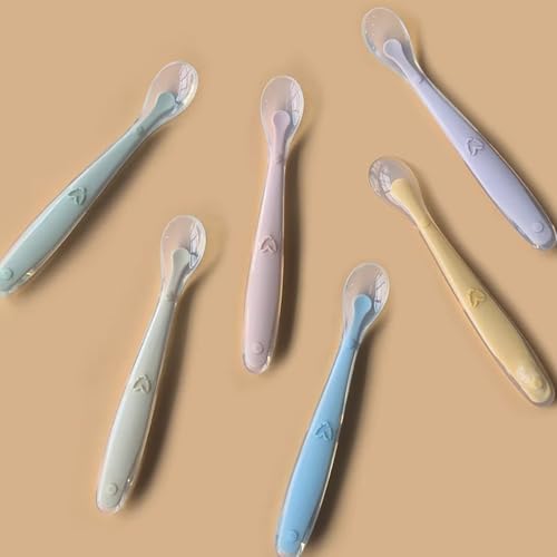 Full packaging view of the Little Rawr two count green silicone training spoons with portable carry box for travel.