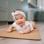 Close up of vegan leather texture on Ava + Oliver changing pad