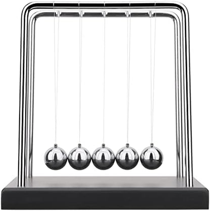 Close up of polished steel balls on Newton cradle gadget
