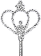 Child holding silver fairy wand during pretend play