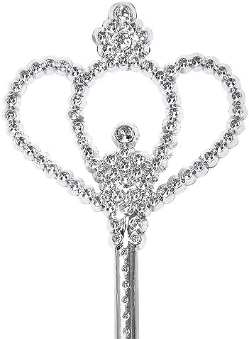 Child holding silver fairy wand during pretend play