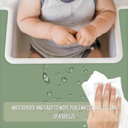 Sage green slip resistant silicone mat keeping a baby bowl steady.
