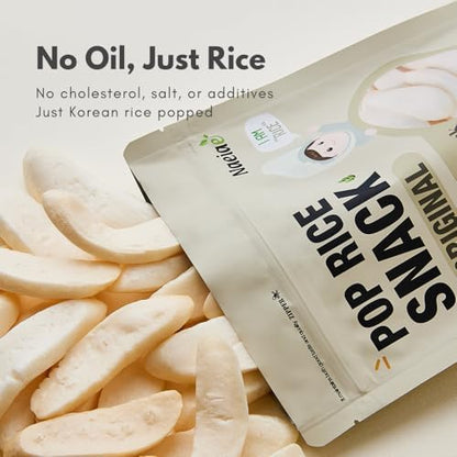 Close up view of the oval shaped gluten free popped rice snack pieces designed for toddler hands.