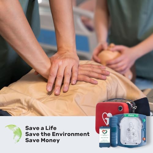 Vbegin M5070A battery being inserted into a defibrillator unit for installation.