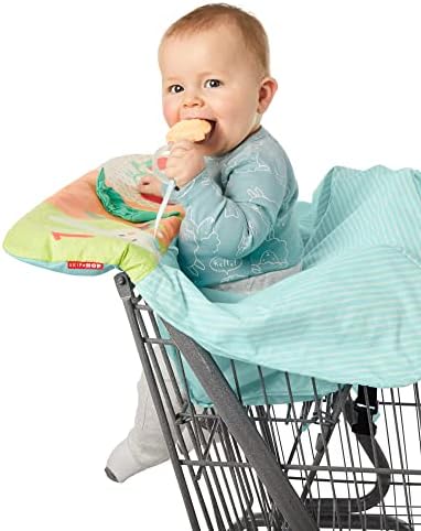 Skip Hop Take Cover baby cart liner installed over a large metal shopping trolley seat.