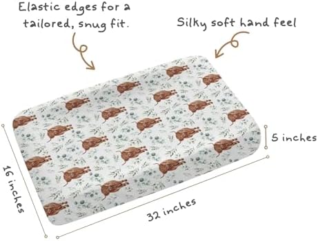 Tewrnvioc nursery sheet folded to highlight watercolor botanical pattern