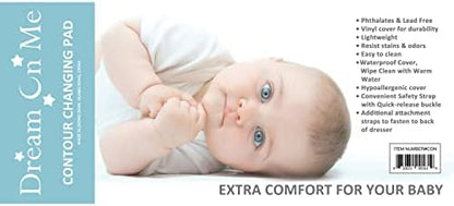 Dream On Me changing pad on top of white nursery dresser