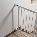 Pet gate stabilizer cups preventing scratches on a home wooden doorway