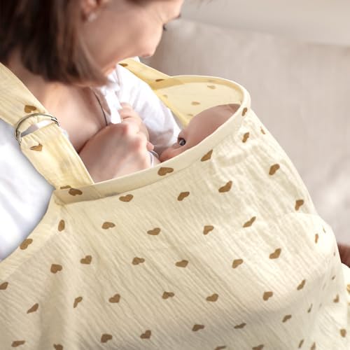 Mother using Hooyax cover as breastfeeding privacy shield