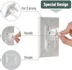 White child safety outlet covers installed on wall