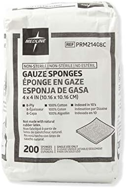 Four by four inch cotton gauze pads stacked closely together
