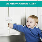 Adoric baby safety locks installed on a kitchen cabinet