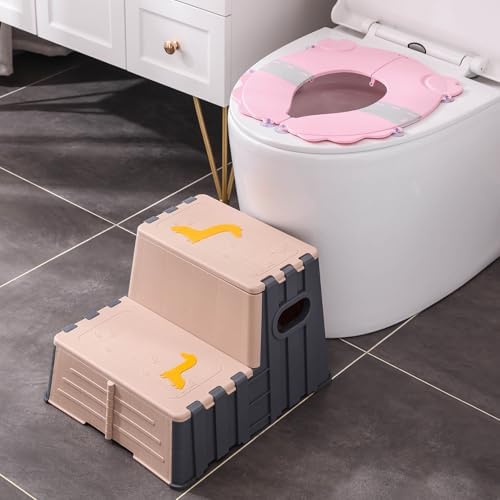DIJIAMEIYA pink travel potty training seat being folded flat with one hand