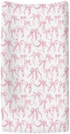 ZoUbqchY nursery sheet folded to show watercolor bow textile design.