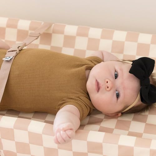 Tiny Twinkle nursery changing pad with safety strap and non-slip base