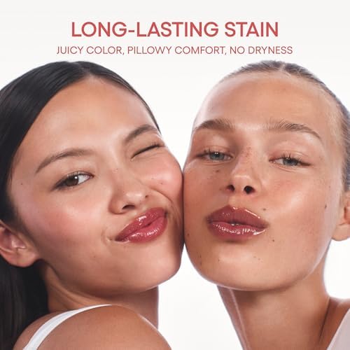LANEIGE JuicePop Box Lip Tint clipped onto a bag using the practical on-the-go loop handle