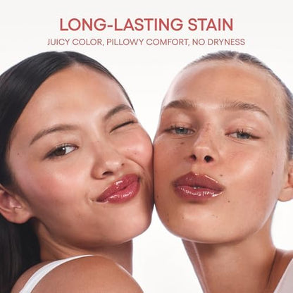 LANEIGE JuicePop Box Lip Tint clipped onto a bag using the practical on-the-go loop handle