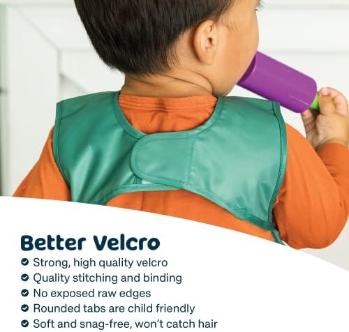 Premium lightweight baby bib showing the large built in flip pocket catching food crumbs.