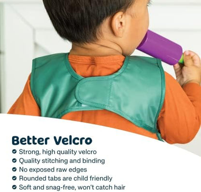 Premium lightweight baby bib showing the large built in flip pocket catching food crumbs.
