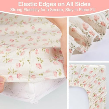 Basumee pink muslin changing sheets installed on standard contoured pad