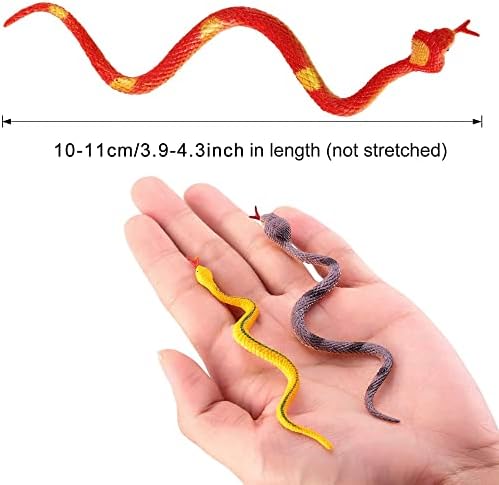 Mini plastic rubber snake toys being used in a garden setting on tree branches to deter birds.