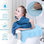 Demonstration of a toddler using the adhesive backed toilet seat cover for sanitary potty training.