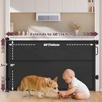 Black extra wide mesh child safety gate fully extended across living room stairs.