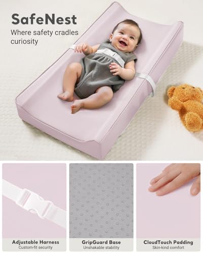 Navari infant travel changing pad being wiped clean with a cloth showing stain resistance