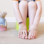 Side view of ABC123 pink potty training watch for toddlers