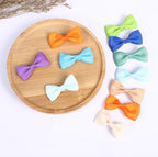 Detailed view of non-slip alligator clip on pet bow